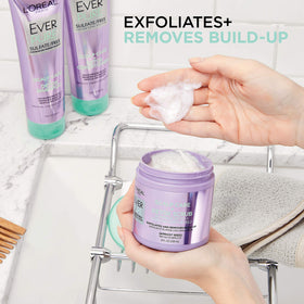 L'Oreal Paris product applied during scalp massage illustrating cleansing and refresh benefit