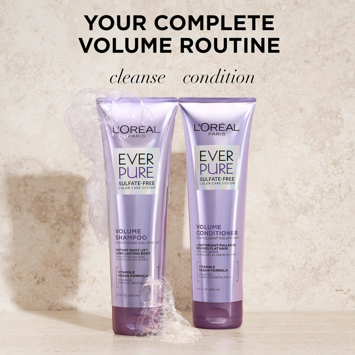 L'Oreal Paris EverPure bottles held in hand to show 8.5 fl oz scale
