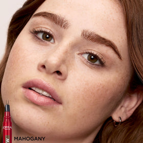 Packaging shot with L'Oreal Paris branding and label highlighting product information benefit