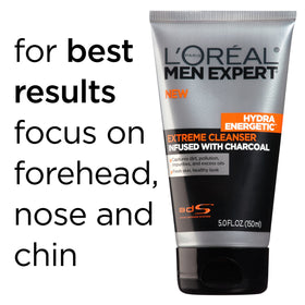 L'Oreal Paris Men Expert tube in hand showing scale and travel convenience