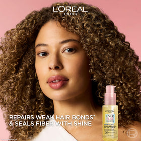 L'Oreal Paris pump dispenser close-up for precise, mess-free application
