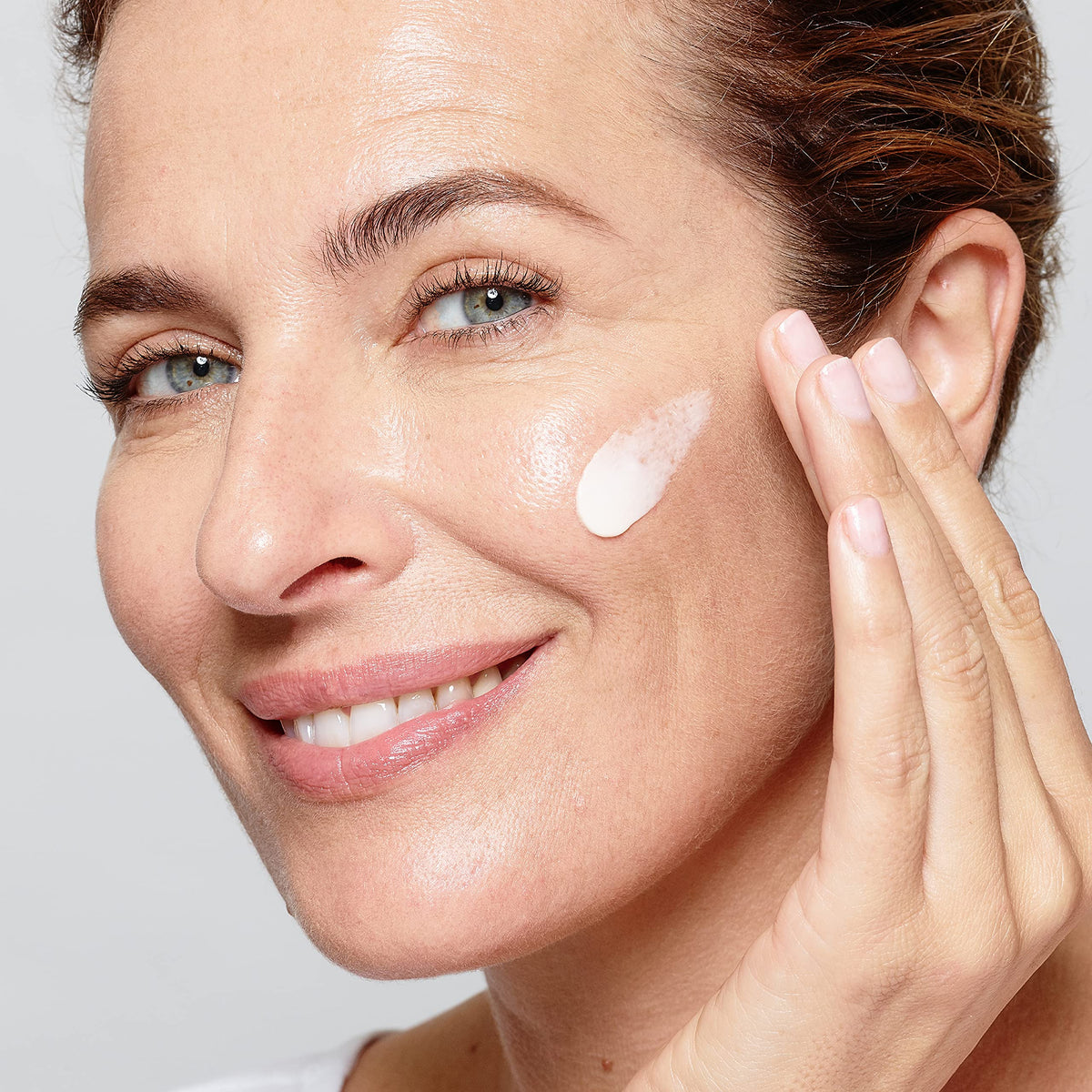 L'Oreal Paris before and after skin demonstrating firmer brighter complexion