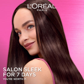 L'Oreal Paris conditioner bottle label showing smoothing formula benefit