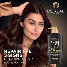 L'Oreal Paris conditioner bottle label detail highlighting protein and ceramide