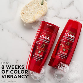 L'Oreal Paris Elvive shampoo texture on hand, highlights smooth linseed-infused formula