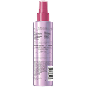 L'Oreal Paris styled hair in lifestyle scene showing soft, shiny, color-cared results