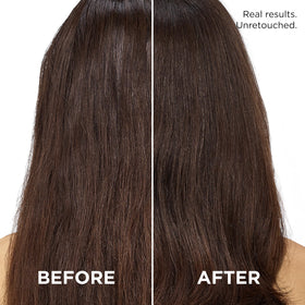 L'Oreal Paris light-textured spray on hand showing quick-absorption and non-greasy feel