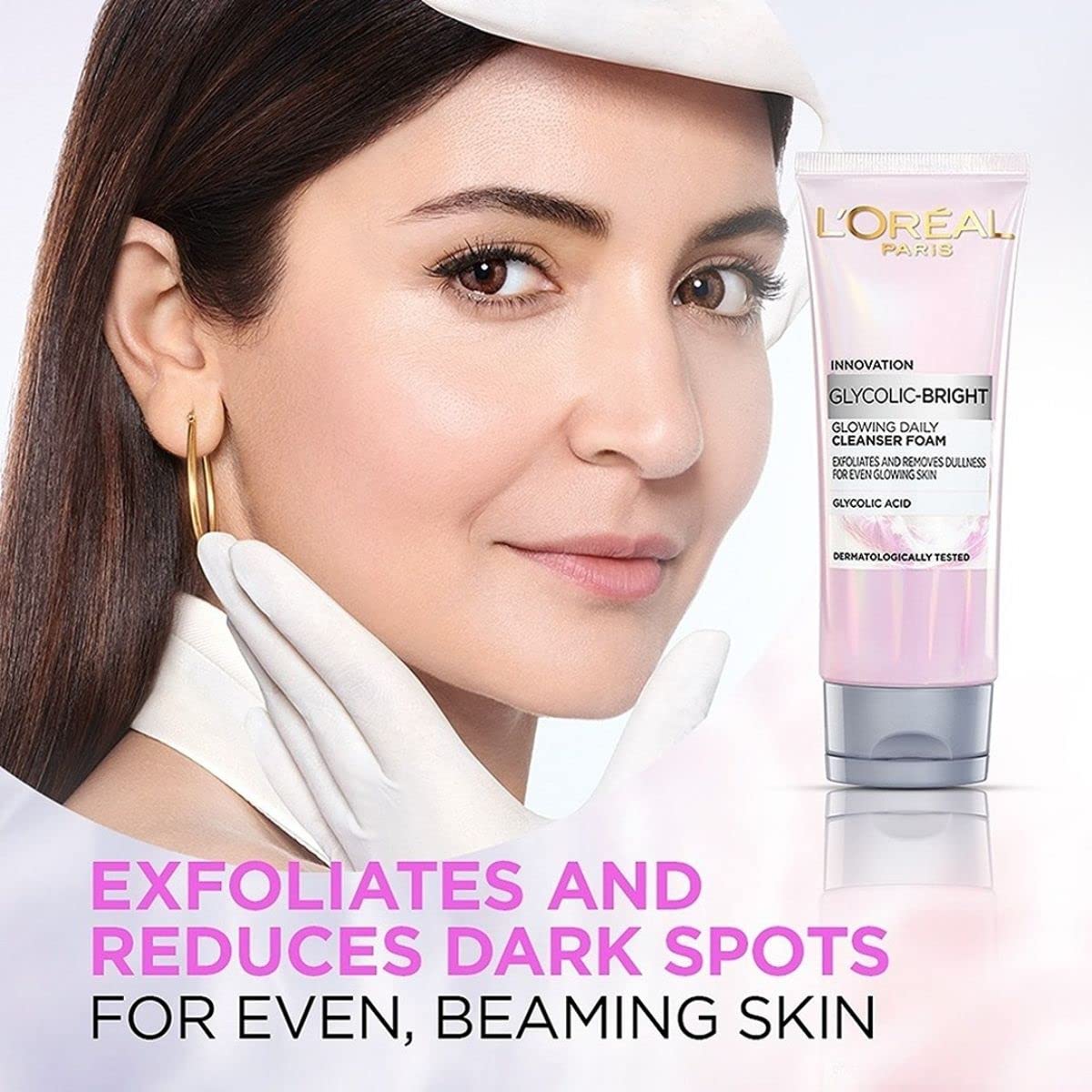 L'Oreal Paris dispensing cleanser texture from nozzle showing smooth foam