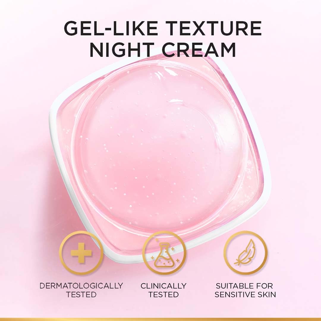 L'Oreal Paris cream on fingertip demonstrating easy spreadability benefit