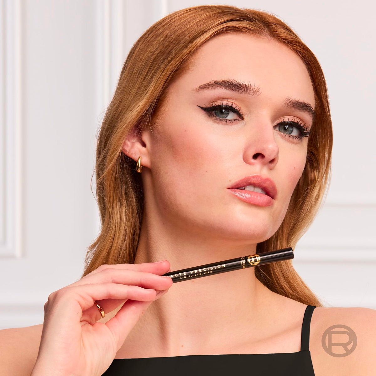 L'Oreal Paris eyeliner next to ruler for size reference and pen-scale clarity