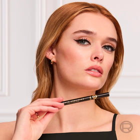 L'Oreal Paris eyeliner next to ruler for size reference and pen-scale clarity