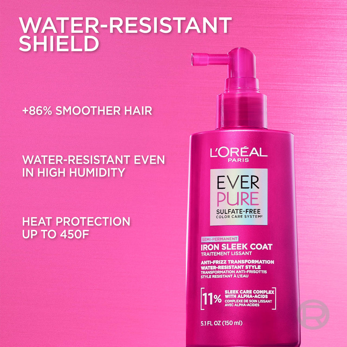 L'Oreal Paris bottle held in hand showing product size and travel convenience
