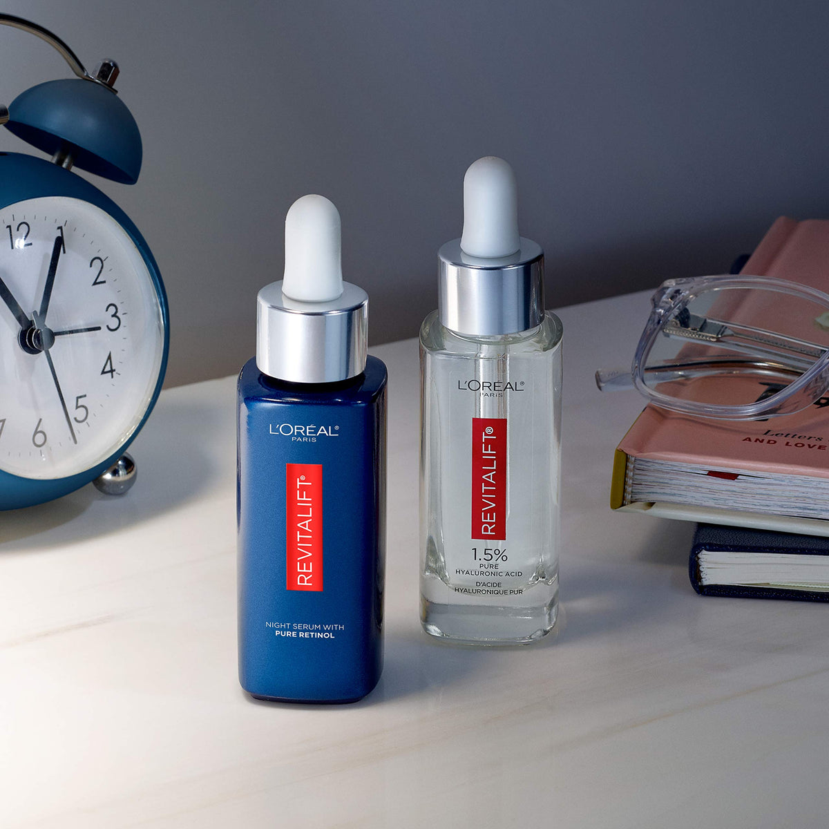 L'Oreal Paris serums staged in bathroom routine conveying everyday use