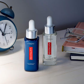 L'Oreal Paris serums staged in bathroom routine conveying everyday use