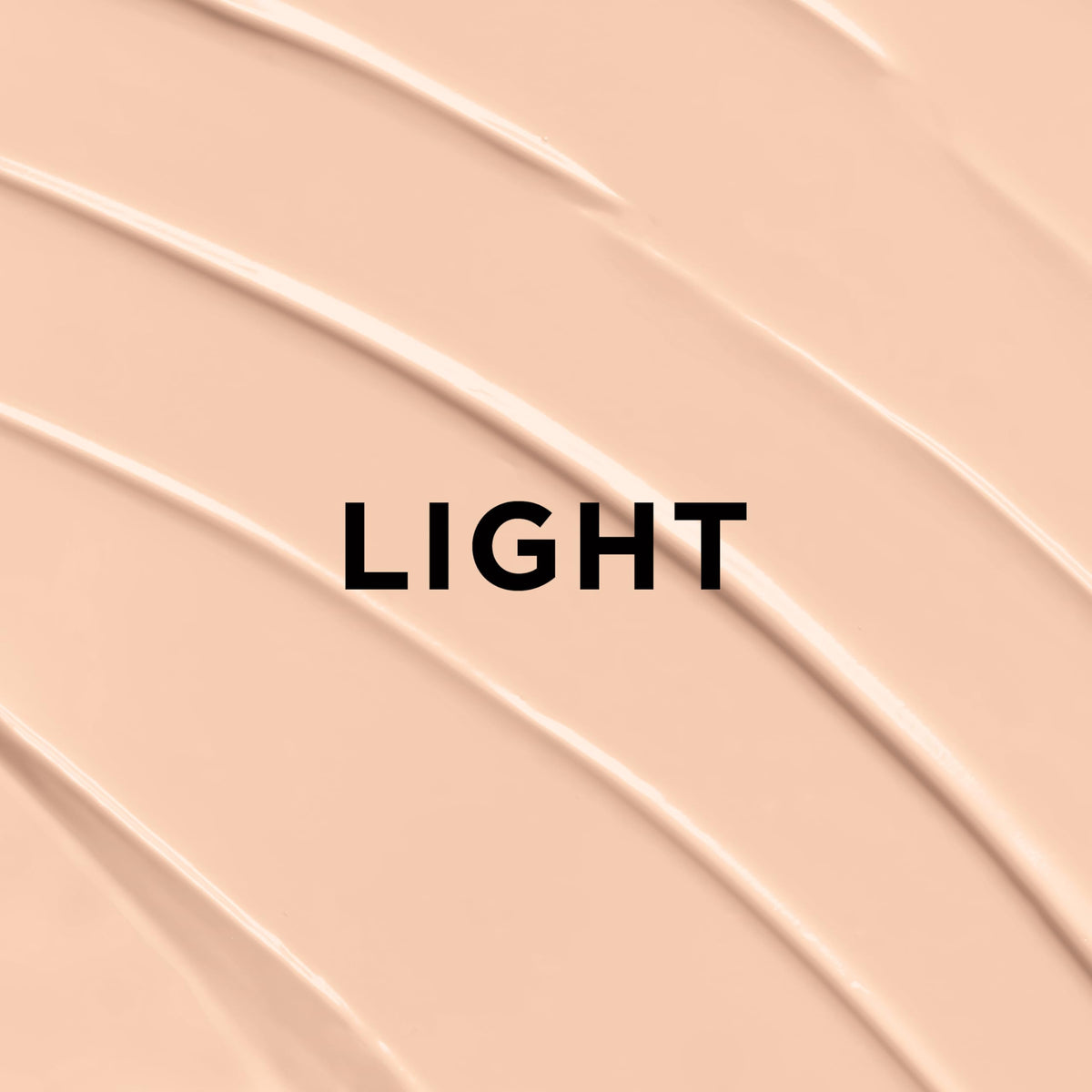 L'Oreal Paris BB cream on a vanity with brush and vitamins for daily routine