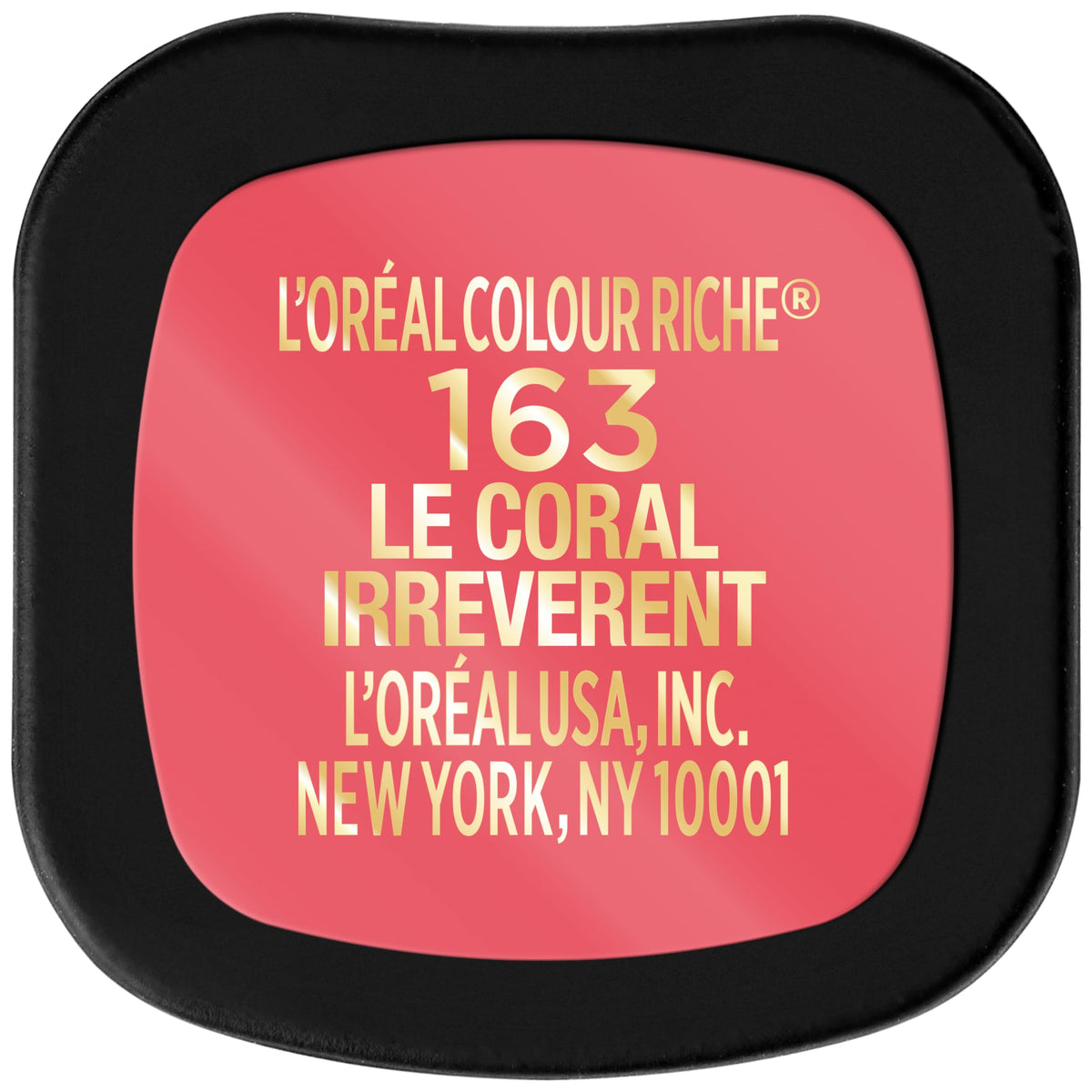 L'Oreal Paris lifestyle image of woman wearing coral lipstick illustrating vibrant everyday wear