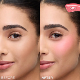L'Oreal Paris model applying blush to cheeks for a natural glow