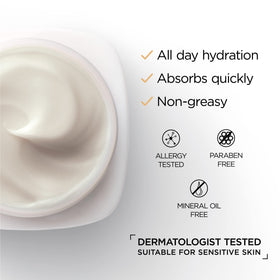 L'Oreal Paris open jar top view highlighting creamy, non-greasy moisturizer