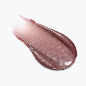 L'Oreal Paris lip oil in a clutch ready for on-the-go shine and quick touch-ups