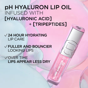 Model applying L'Oreal Paris lip oil in lifestyle scene for everyday radiance