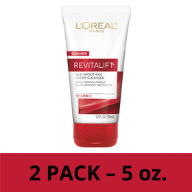 L'Oreal Paris cleanser held in hand to show tube size and travel convenience
