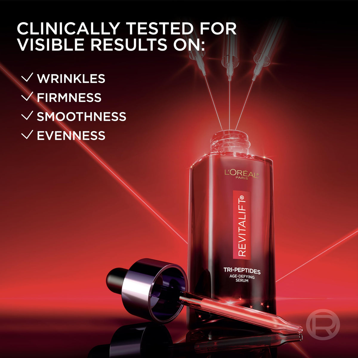 L'Oreal Paris label close-up listing tri-peptides, hyaluronic acid, and vitamin C to explain benefits