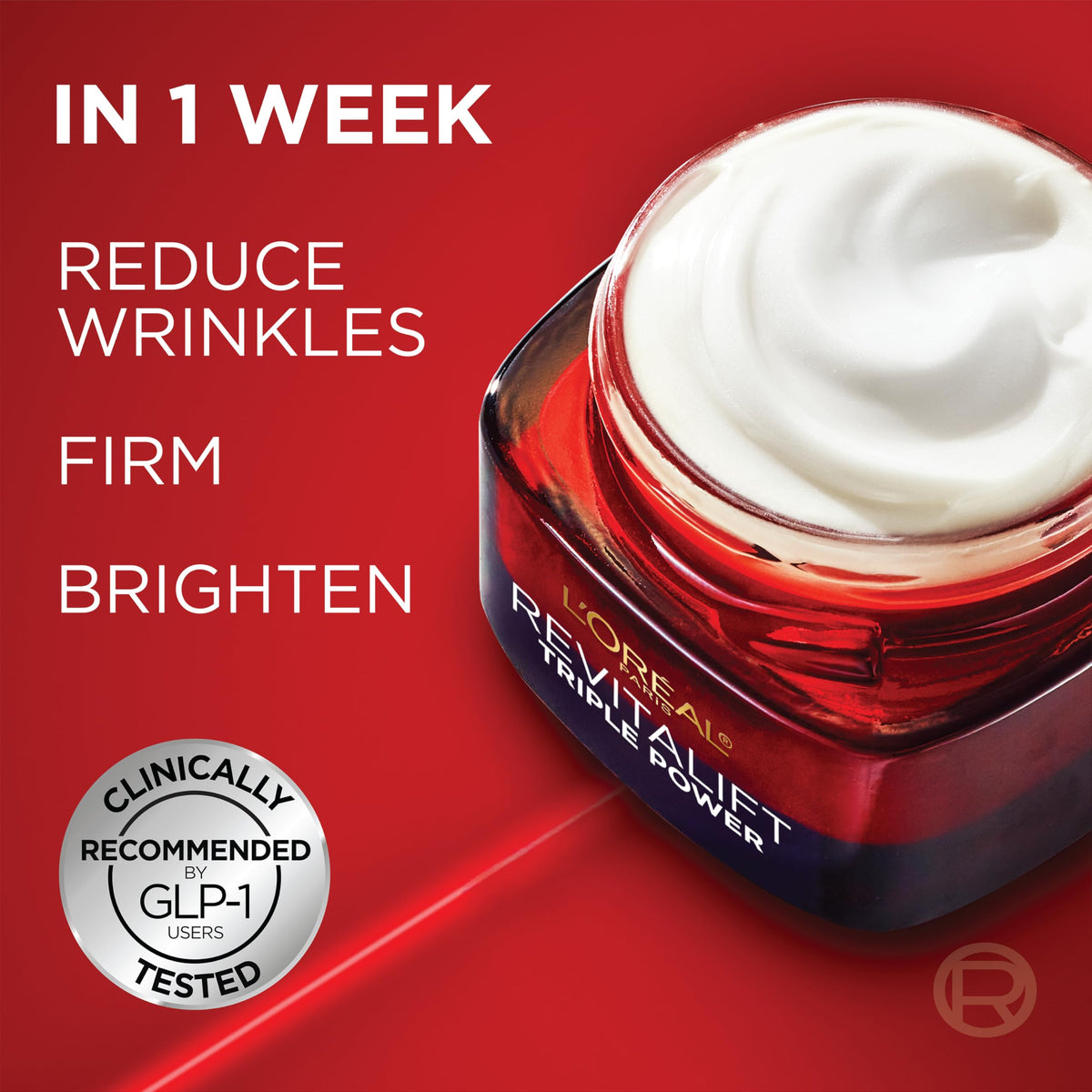 L'Oreal Paris cream on fingertip illustrating easy application and absorption