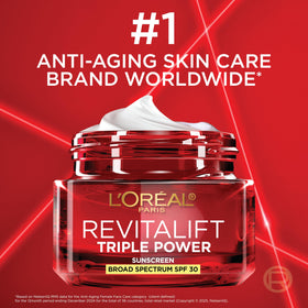 L'Oreal Paris tube beside a ruler showing compact size and travel convenience
