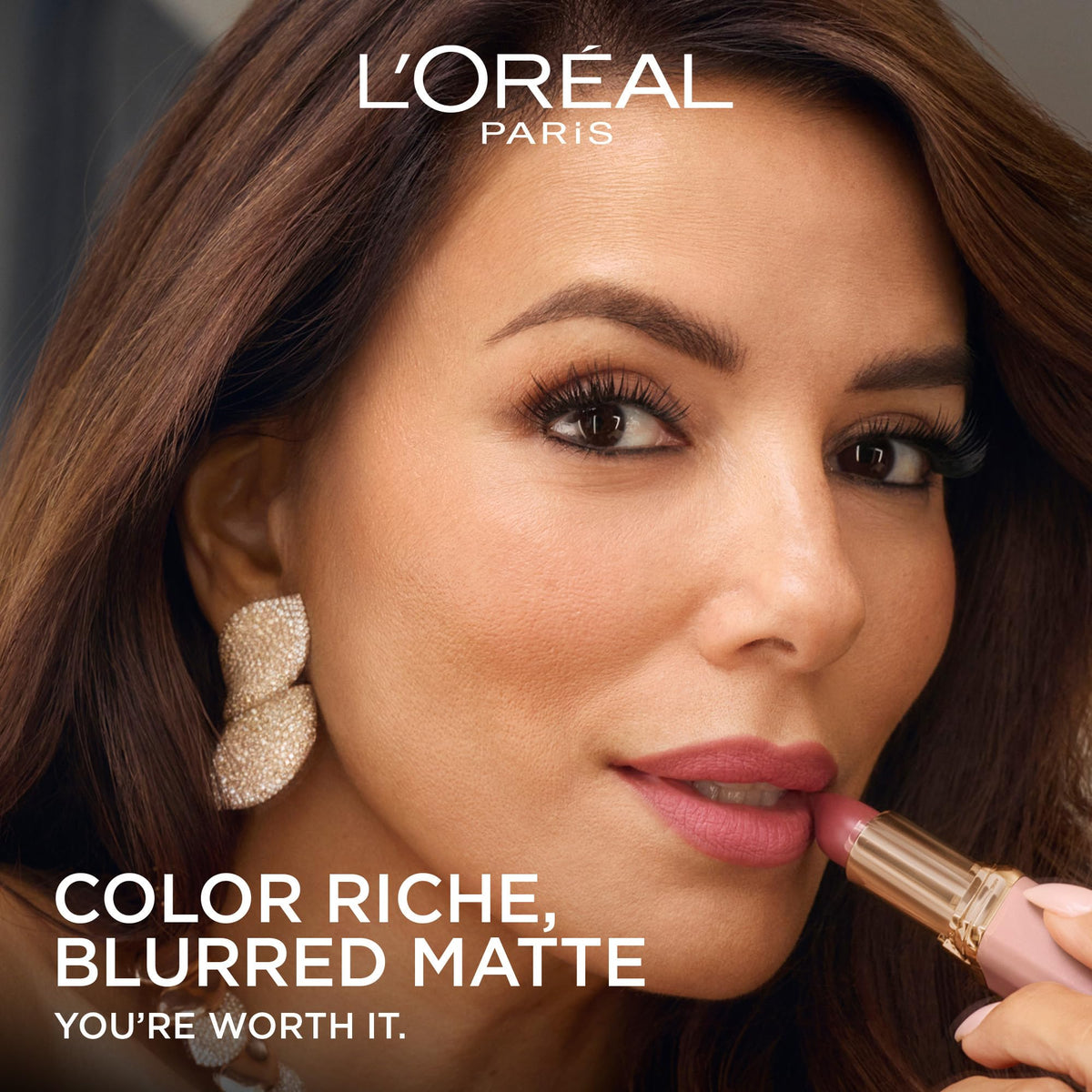 L'Oreal Paris in handbag on makeup table showing everyday lifestyle versatility