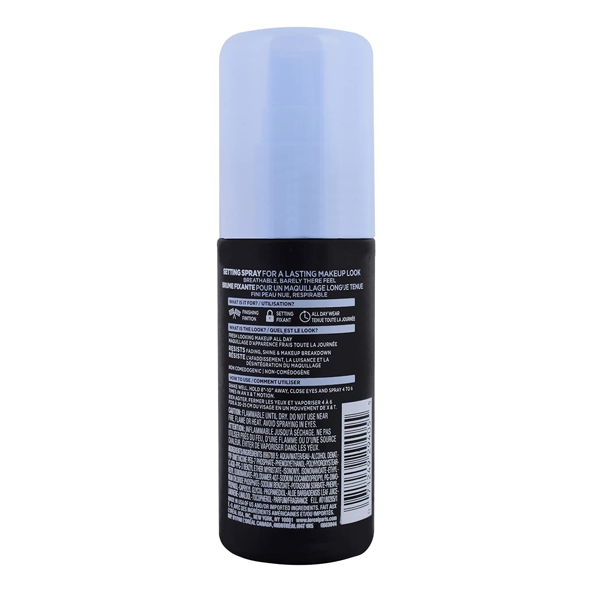 L'Oreal Paris bottle held in hand to show 3.4 oz size and travel-friendly portability