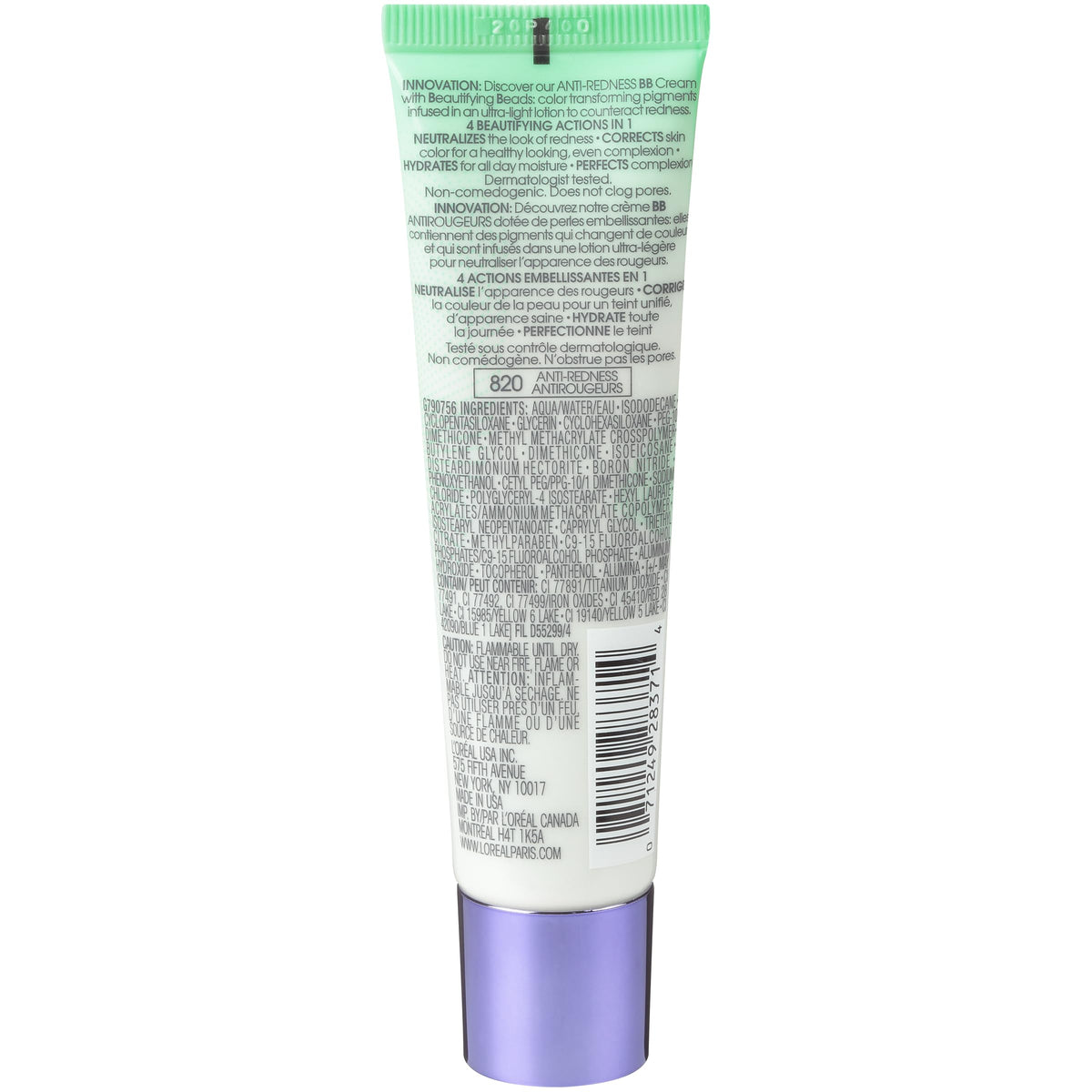 L'Oreal Paris tube in hand displaying 1 fl oz size and portable convenience