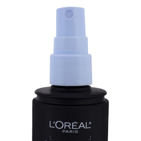 L'Oreal Paris spraying mist onto model's face to show easy, full-face application benefit