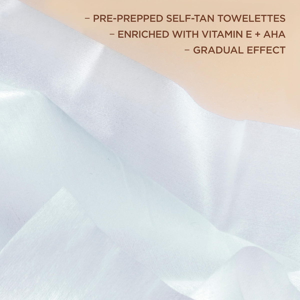 L'Oreal Paris model applying towelette in hand for mess-free tan