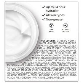 L'Oreal Paris open jar top view revealing smooth non-greasy cream