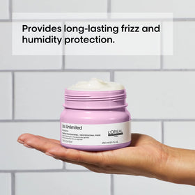 L'Oréal Professionnel open tube in hand ready to apply for control