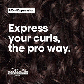 L'Oréal Professionnel Paris jar in hand showing product size and travel-friendly benefit