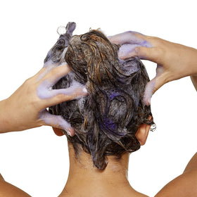 L'Oréal Professionnel close-up label showing active ingredients and protect system