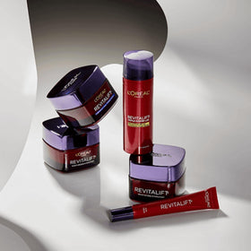 L'Oreal Paris jar beside box showing packaging and contents together