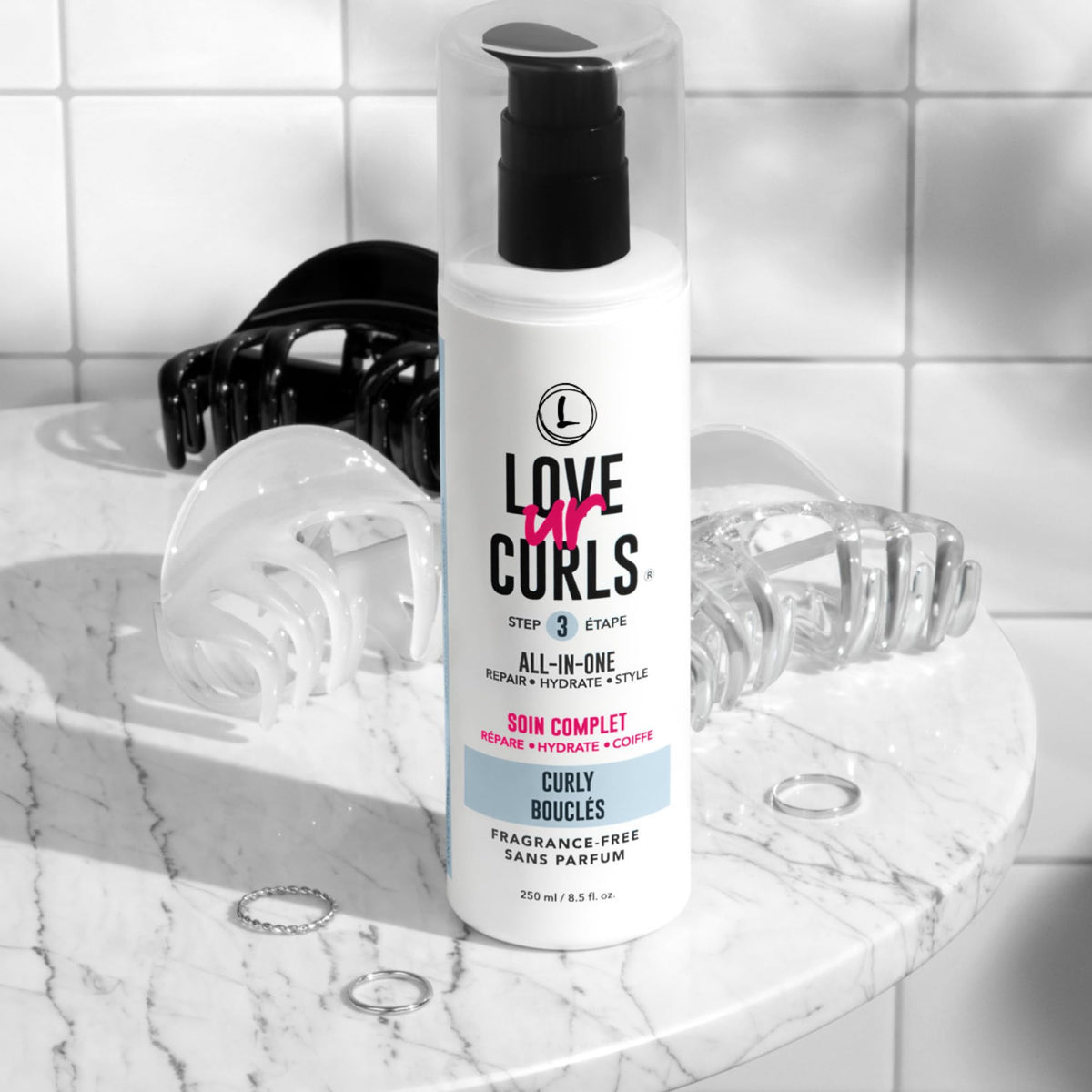 Love Ur Curls being applied to damp curls demonstrating even distribution and definition
