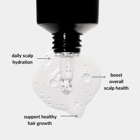Love Ur Curls applicator tip delivering targeted drops for precise scalp treatment benefit