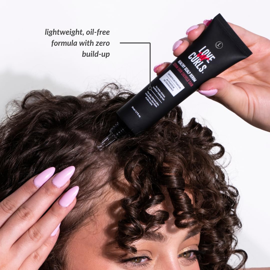 Love Ur Curls in-use on scalp model applying serum for targeted hydration and density benefit