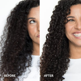 Love Ur Curls all-in-one styler pumped onto hand for easy application