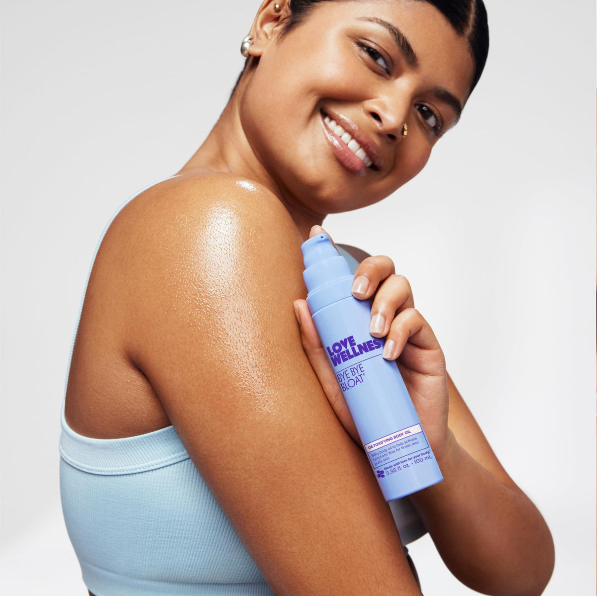 Love Wellness bottle on bathroom counter suggesting daily self-care ritual