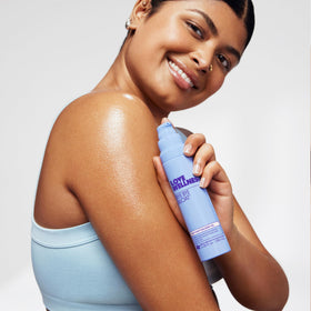 Love Wellness bottle on bathroom counter suggesting daily self-care ritual