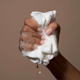 Loved01 wipe next to hand for scale and travel convenience