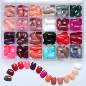 LoveOurHome nails held to show XS short squoval size and scale