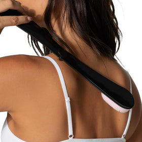 Loving Tan close-up of soft foam applicator demonstrating smooth blend