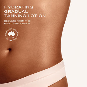 Loving Tan tinted lotion swiped on arm for instant guide colour and blending benefit