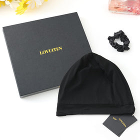 LOVUITEN bonnet on model for size comparison showing coverage benefit: fits most head sizes