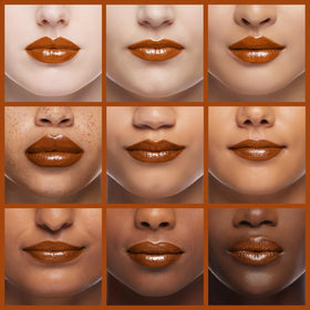 L'Paige lip application closeup showing luminous finish and flattering warmth